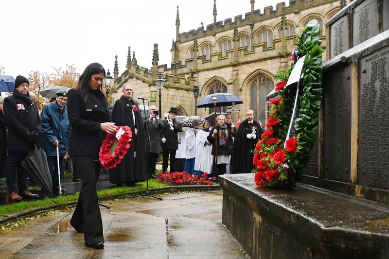 Lisa laying a wreath for Remembrance Sunday